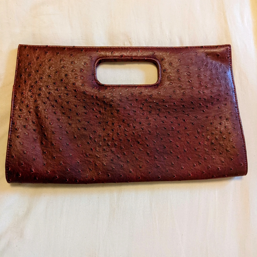 Free with purchase Charming Charlie large maroon clutch bag